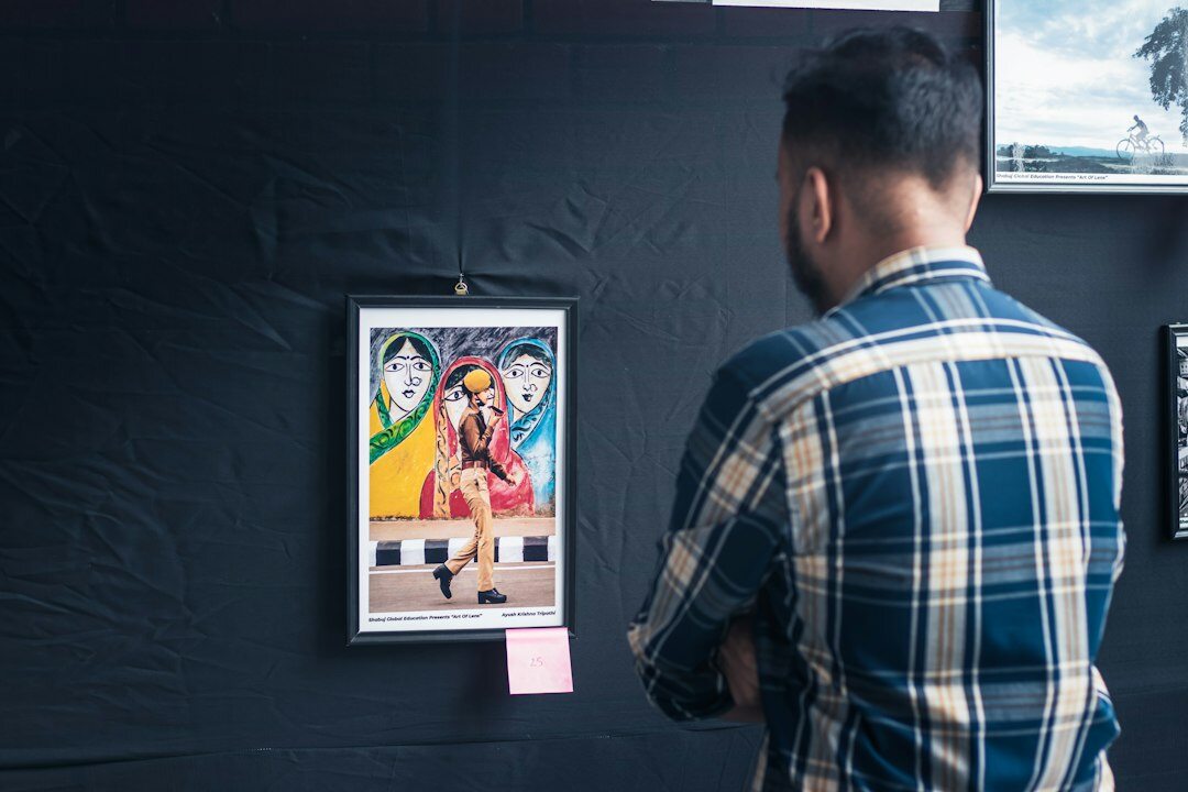 teenager looking at celebrity poster