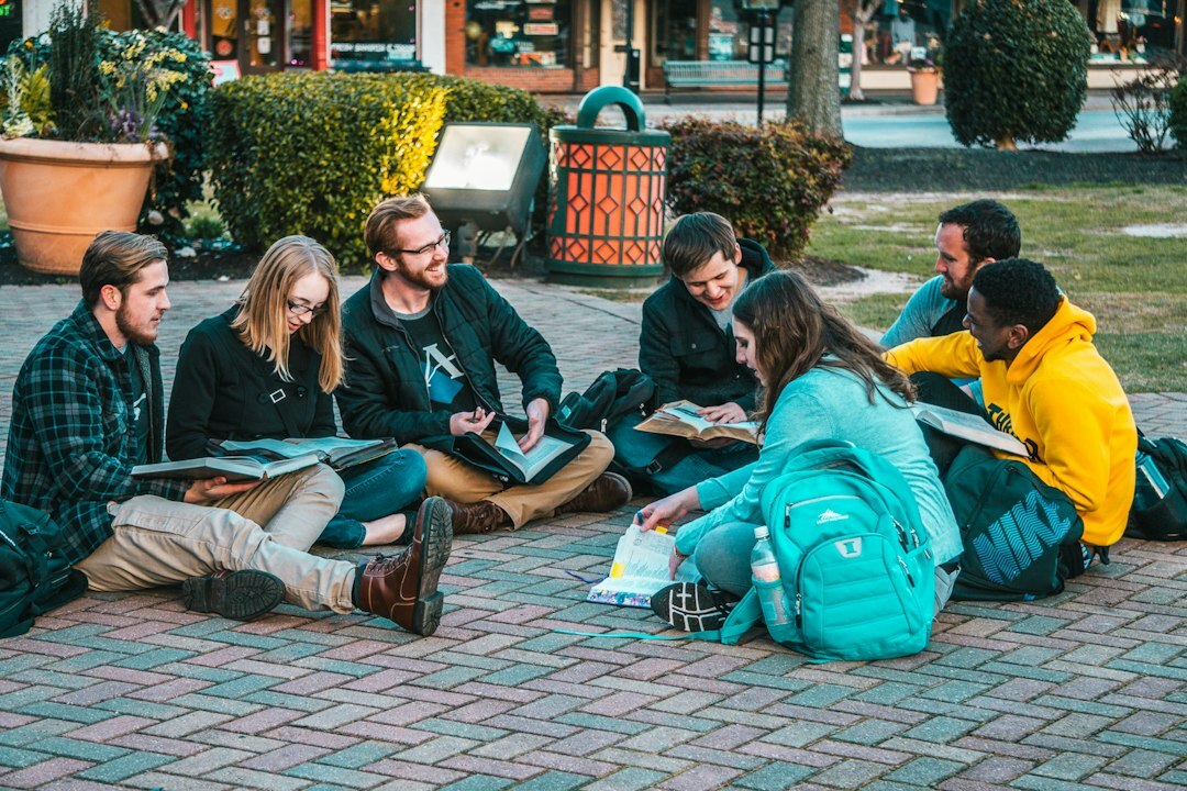 diverse teenagers studying